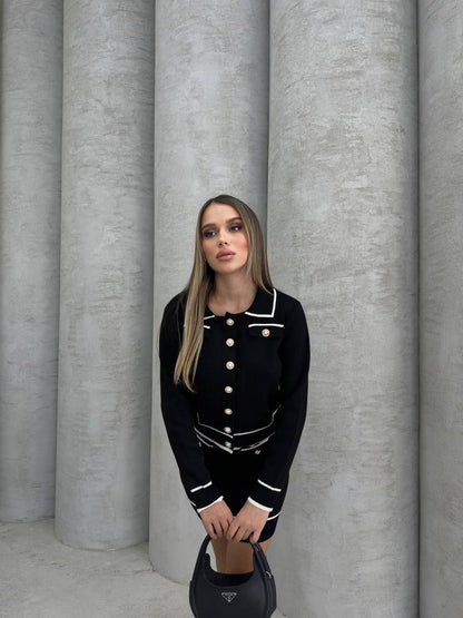 Black Cropped Jacket & Mini Skirt Suit with Gold Button Details.