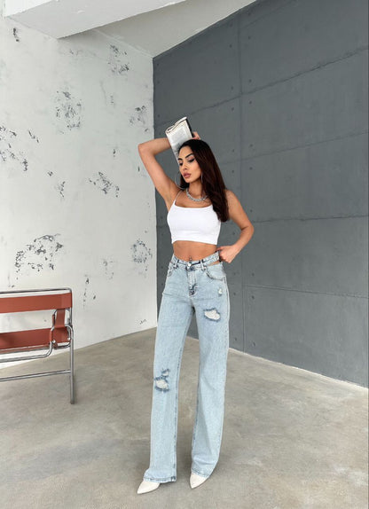 Vintage High-Waisted Light Blue Bootcut Denim Jeans with Distressed Detailing